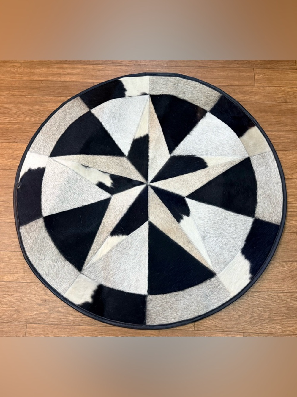 Black & White Star Patchwork Cowhide Round Rug - Home Accents